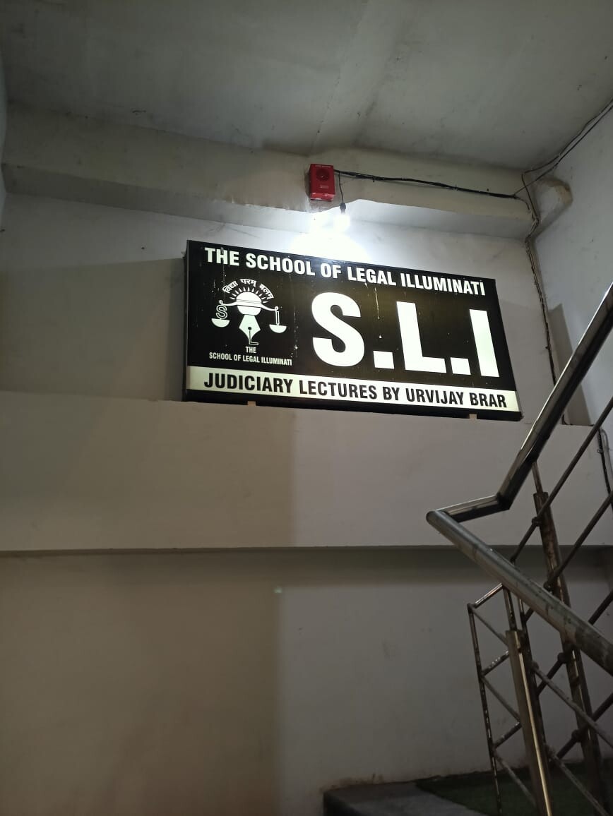 THE SCHOOL OF LEGAL ILLUMINATI ( S.L.I) Logo